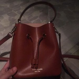 Kate spade bucket bag in red plum color